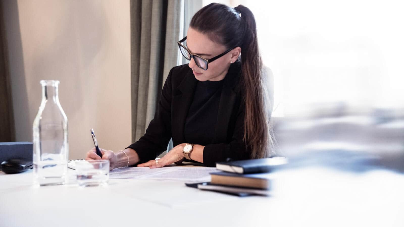 Woman writing report