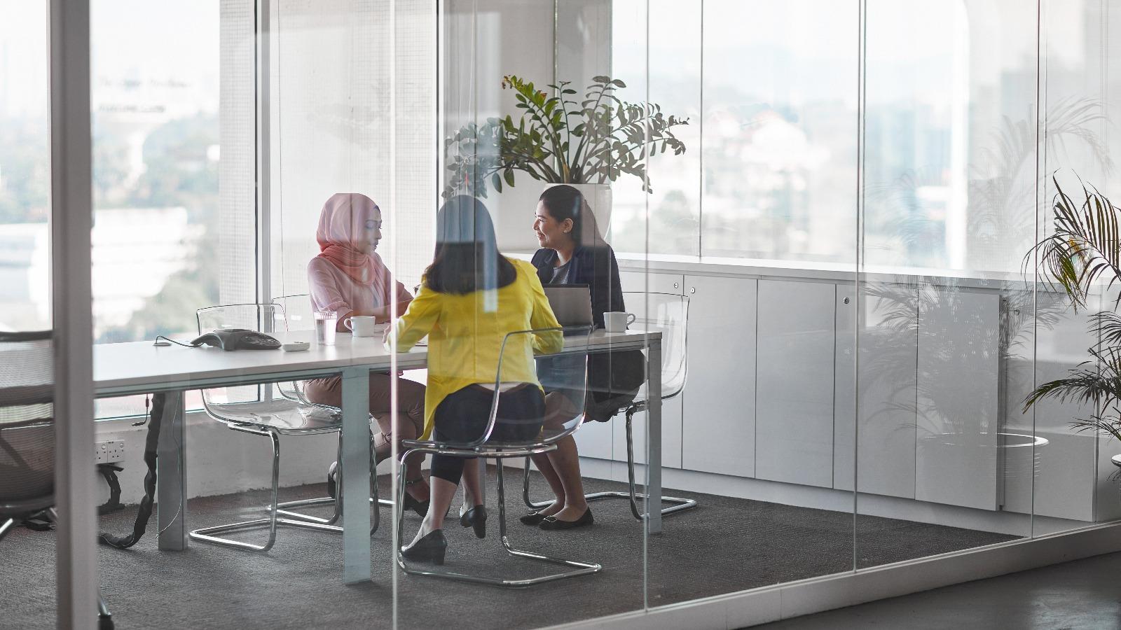 3 people working in the office